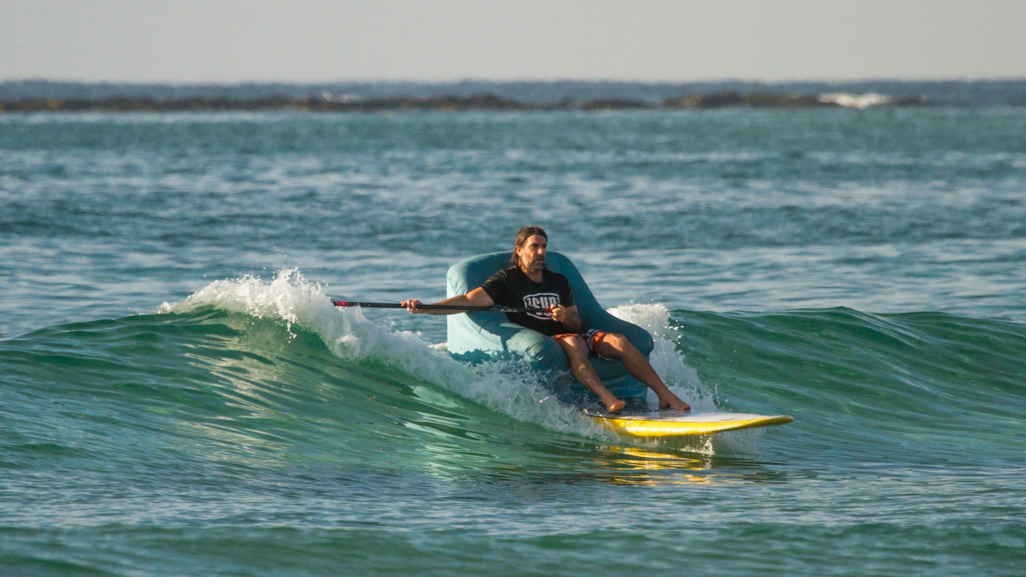 Sit Down Paddle Surfing On a Couch