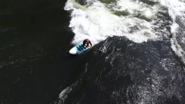 Stand Up Paddle River Surf by Brittany Parker