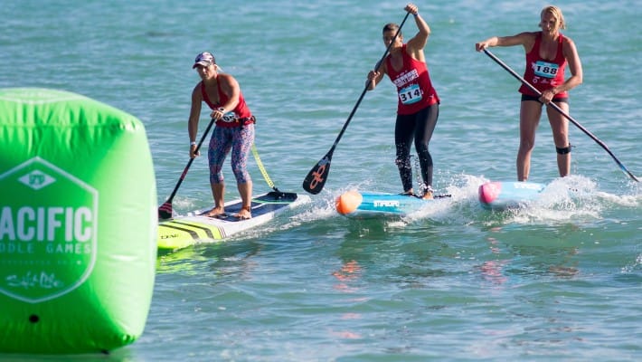 Angela Jackson fends off stiff competition form the likes of Sonni Hönscheid at the 2017 Pacific Paddle Games in Dana Point, California