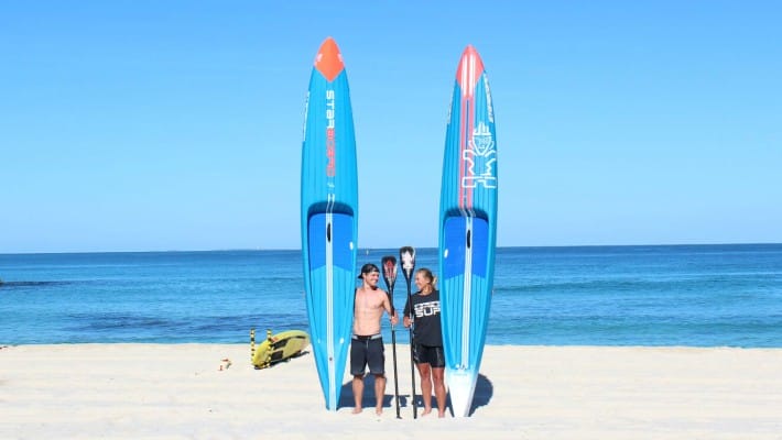 Michael Booth and Belinda Stowell-Brett, both Aussie Starboard SUP riders, pose for the promotion of the Stand Up Surf Shop King of the Cut 2017