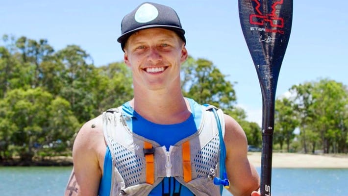 Starboard SUP rider Michael Booth poses for a photo before a training session