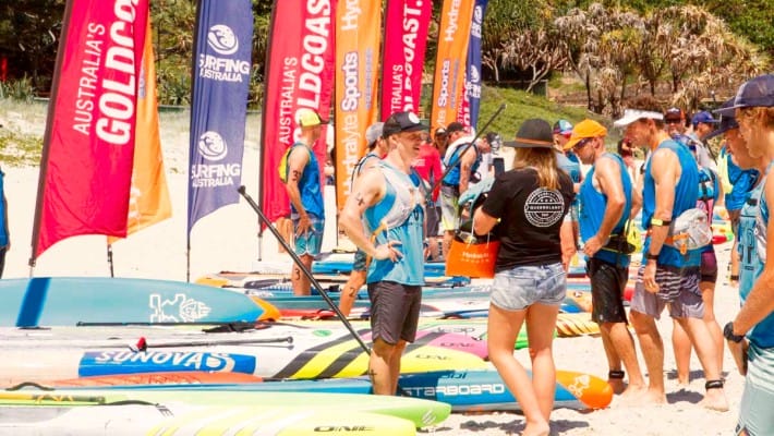 Michael Booth chats with a female SUP rider counterpart between races at the 2017 Australian SUP Championship
