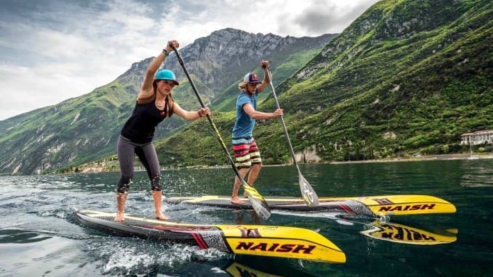 Slovenian all-star SUP rider Manca Notar trains in Slovenia alongside Casper Steinfath at the foot of the Alps in Slovenia