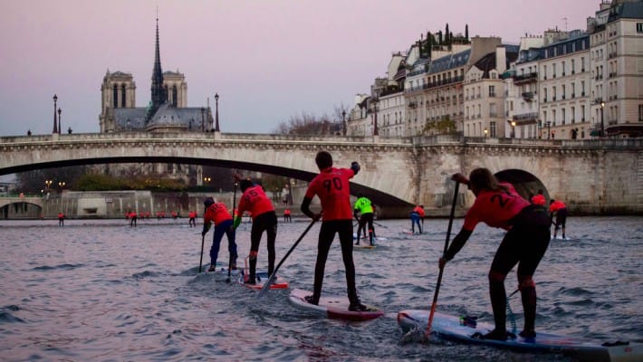 Paddlers battle it out at the 2016 Nautic SUP Paris Crossing