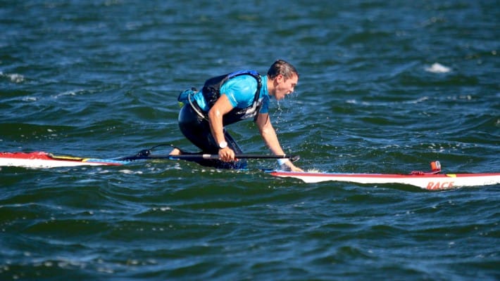 Paul Lenfant aboard his SUP boards during a competition
