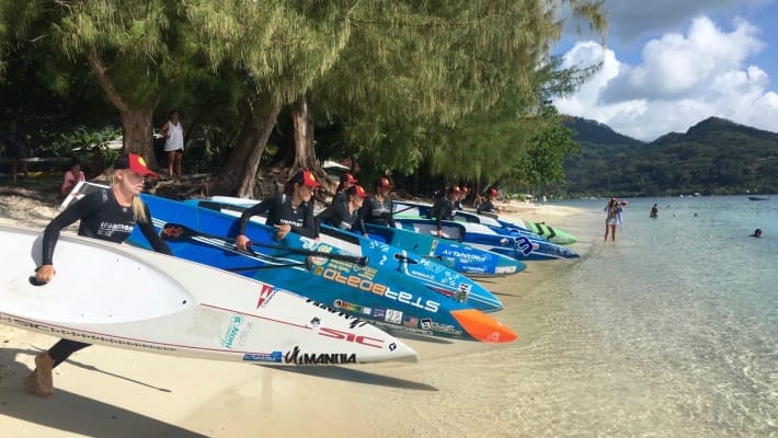 Athletes, including Starboard SUP rider Olivia Piana, set out for a SUP trial as part of Ironmana 2017