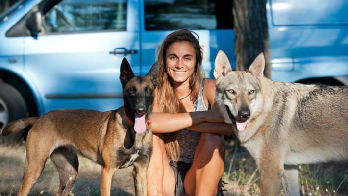 Olivia Piana accompanied by her belloved wolfhounds near her home in France